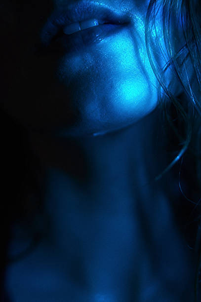 istock Water Droplets on Chin and Jawline in Blue Light 2236427823