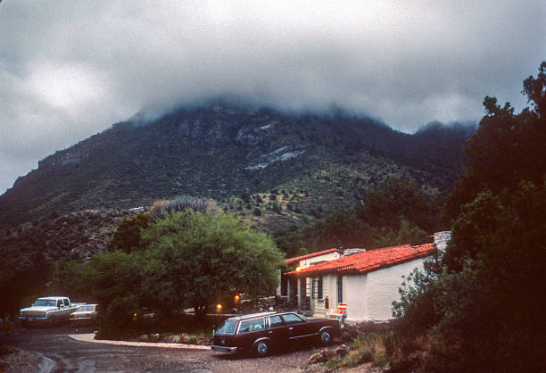 istock Big Bend NP - Mountains, Clouds & Cabin at Chisos Basin - 1984 2236433614