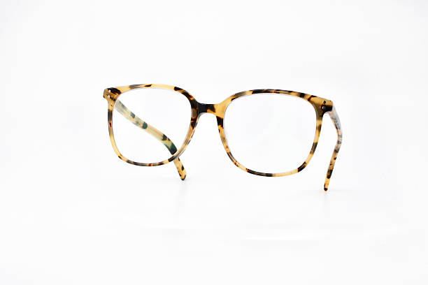 istock Pair of pretty women's glasses with a patterned frame on a white background 2236436836