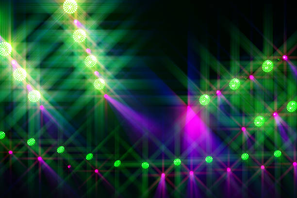 istock Stage light beams are green and purple on a blue background. 2236443512