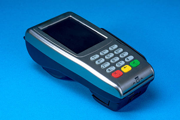 istock Pos terminal on blue background for electronic payments 2236450200