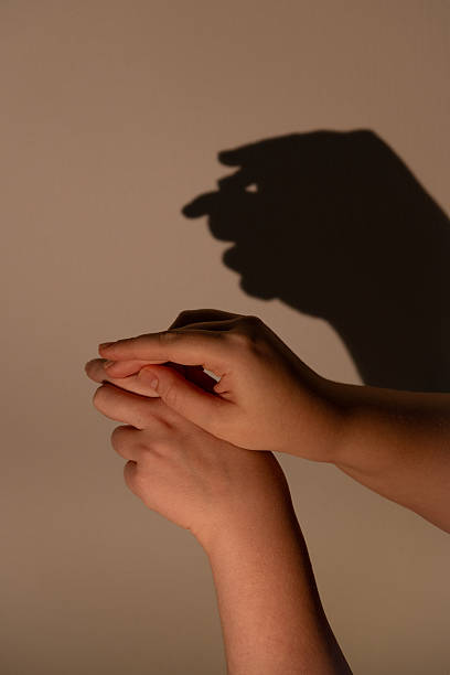 istock Hand shadow accidentally resembling a famous politician 2236454130
