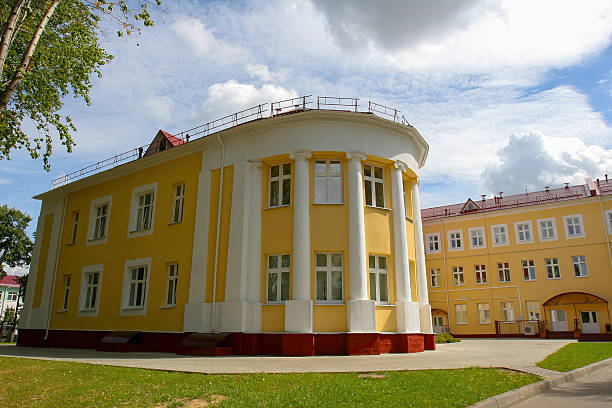 istock Brightly colored building with modern architecture located in a peaceful park during a clear summer day 2236456012