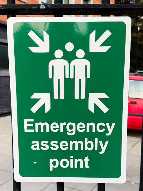 istock Emergency assembly point sign at a commercial building in UK 2236461710