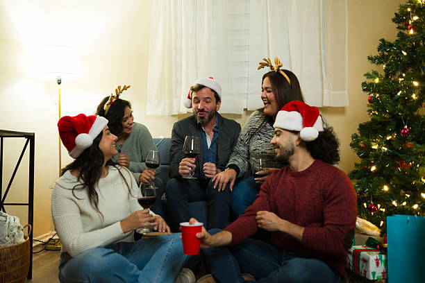 istock Laughing crowd celebrating christmas holidays at home party 2236466040