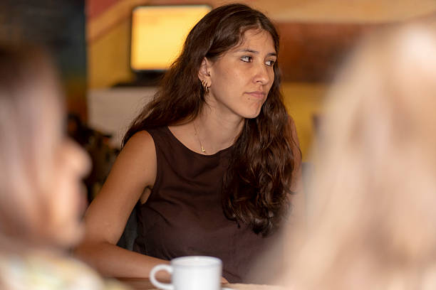 istock women socializing and chatting while enjoying a coffee 2236467967