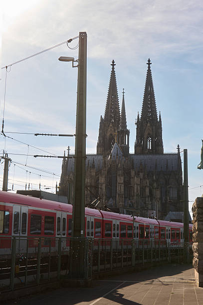 istock Cologne cathedral, train, and monument along the rhine river 2236472572