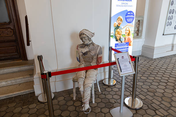 Vienna, Austria - April 20, 2024: The entrance with a stature on the side.