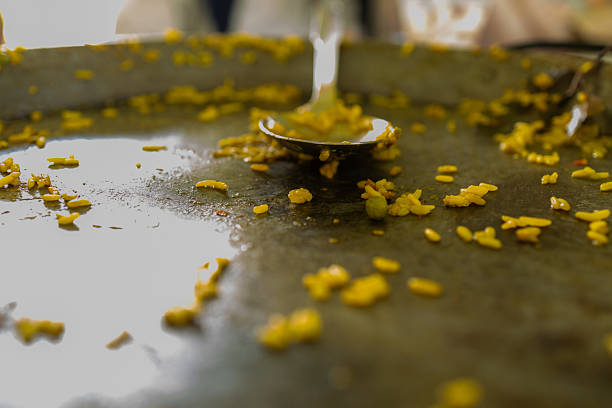 istock Paella leftovers in a pan with serving spoon 2236478008