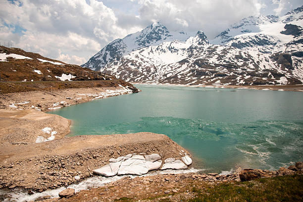 Lago Bianco is situated in the Bernina Range, within the canton of Graubünden (Grisons), Switzerland