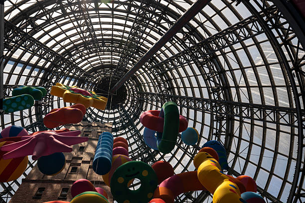 Melbourne, Australia: December 29, 2024: The Coop Shot Tower, located in central Melbourne at Central Railway Station, was completed in 1888, stands 50 metres tall, and is decorated with Christmas ornaments.