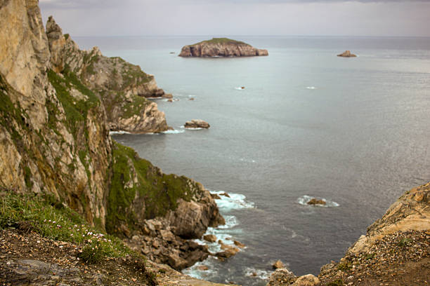 cliffs and rocks during sunset in Cabo Penas, Asturias, Spain