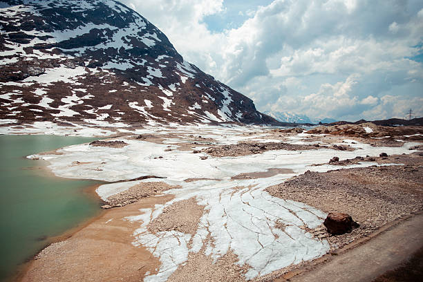 Lago Bianco is situated in the Bernina Range, within the canton of Graubünden (Grisons), Switzerland