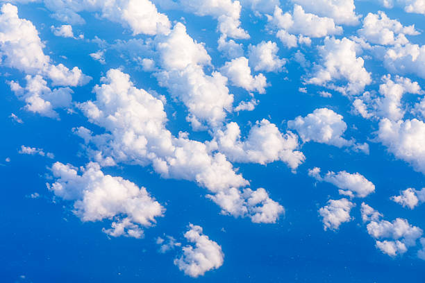 istock Breathtaking blue sky with fluffy white clouds 2236487036