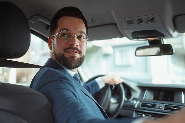 istock Businessman Driving Car 2236489700
