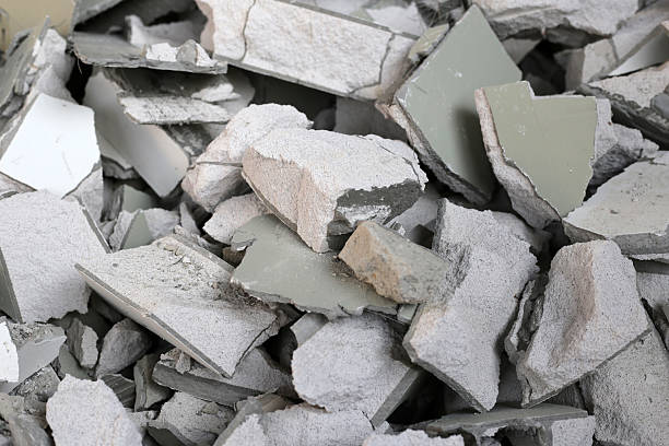 istock Broken concrete, Piles of lightweight construction bricks after house demolition 2236489719