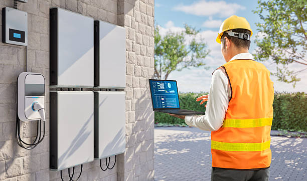 istock Asian engineer or technician install home ev charger with battery energy storage system for residential used 2236489813