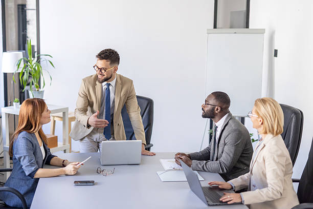 istock Team Collaboration and Presentation in Conference Room 2236490921