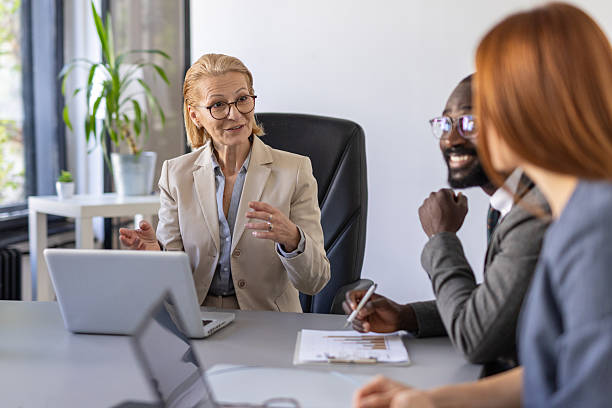 istock Team Brainstorming and Sharing Ideas in a Meeting 2236490977