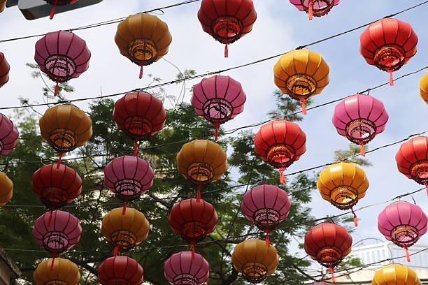 istock A bunch of colorful lanterns hanging from a wire 2236493179