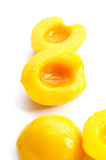 Peach halves in syrup. Fruity desserts
