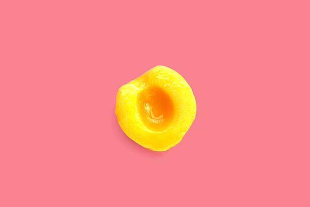 istock Peach halves in syrup. Fruity desserts 2236493349