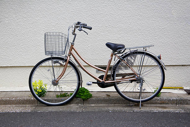 istock Bicycle parked beside a wall in Japan. 2236493860
