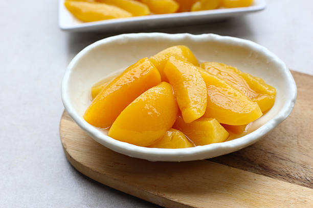 istock Sliced peaches in syrup served in a bowl 2236494578