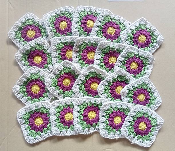 Handmade crochet granny square for illustration background texture.