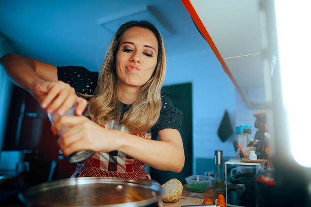istock Home Cook Overusing Salt in her Homemade Soup 2236499519