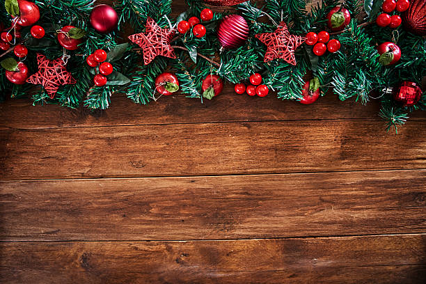 istock Top view of Christmas garlands on rustic wooden table 2236500372