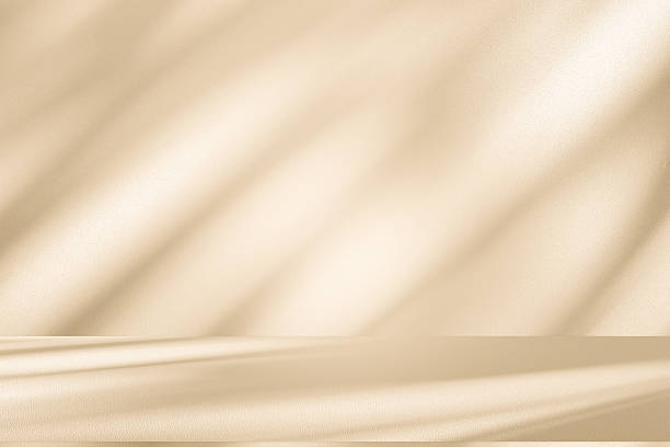 istock Studio style background wall decoration presentation uses white and beige tones. with shadows cast from a nearby window, concept creating a decorative 2236510914