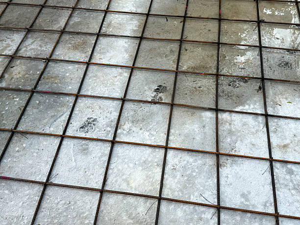 istock A grey and white tile floor with a metal grid 2236514347