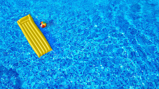 istock mattress and ball in pool 2236519627