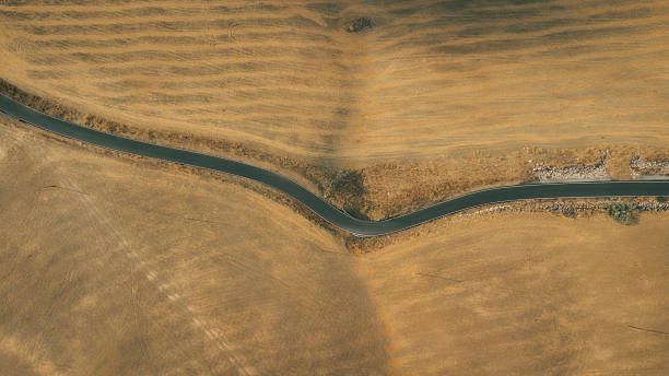istock Arid road seen from a drone 2236529860