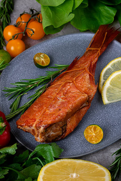istock Smoked redfish served on the gray plate 2236535426
