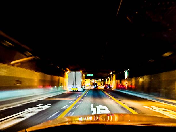 istock Driving through a highway in Tokyo at night 2236538421
