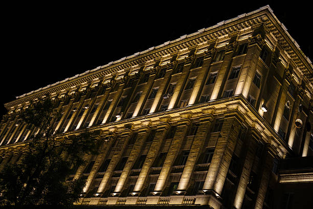 istock Illuminated architectural facade of a building at night 2236542049