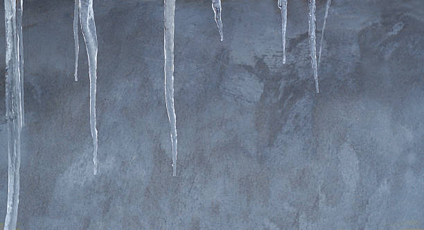istock ice hanging from the roof 2236546990