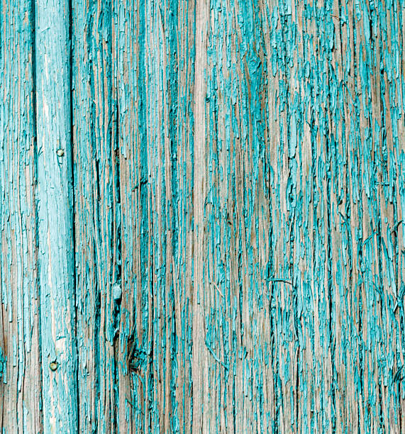 A blue and white wood grain background. The blue is very light