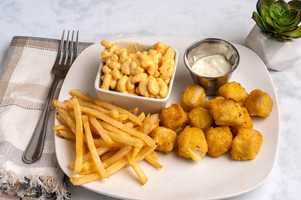 istock haddock bites  with mac and cheese and fries 2236549445