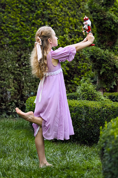 istock Girl dancing with nutcracker Christmas holiday toy 2236557113
