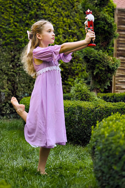 Child holding nutcracker at Christmas holiday season