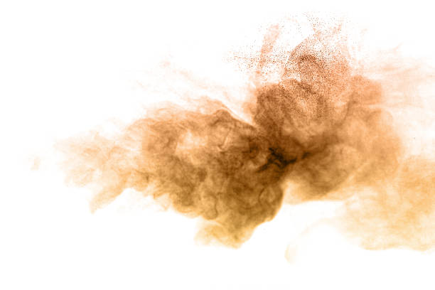 istock Brown dust cloud and powder explosion isolated on white background, symbolizing pollution, dirt, smoke, and abstract texture. Perfect for design, overlays, environmental, or creative projects. 2236558367