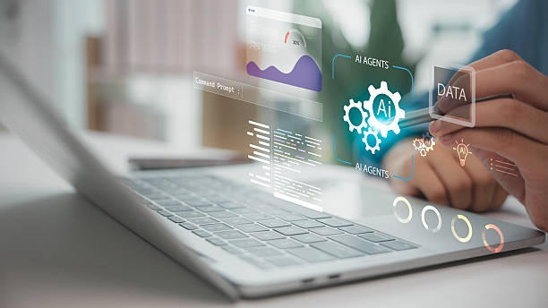 istock AI agents working on data automation and command prompts shown on a laptop screen, representing artificial intelligence, machine learning, coding, and futuristic digital technology. 2236558640