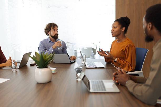 istock Diverse Team Meeting Led by Black Female Professional 2236562295