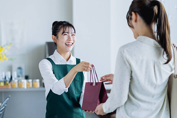 istock Young woman working in a cafe 2236563576