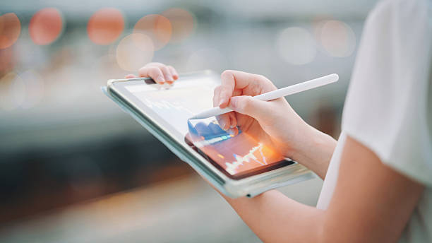 istock Finance expert theme smart investing with AI artificial intelligence cyber data assisting to protect risk and growth her wealth with big data 2236564709