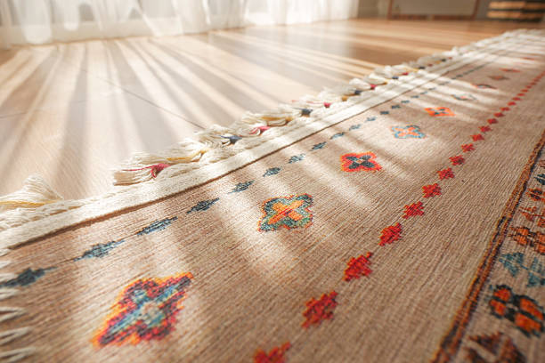 istock Warm sunlight illuminating a beautiful patterned rug indoors 2236569144