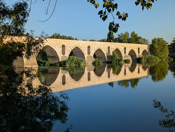 istock Stone bridge over Douro river. Zamora city, Castile-Leon, Spain 2236579937